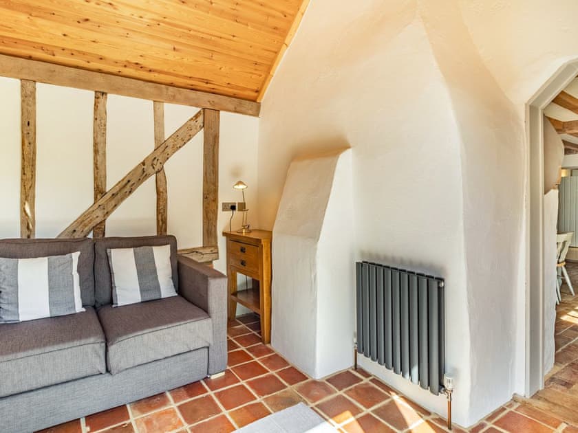 Hall area with sofa bed | Bakers Cottage, Hoxne, near Eye