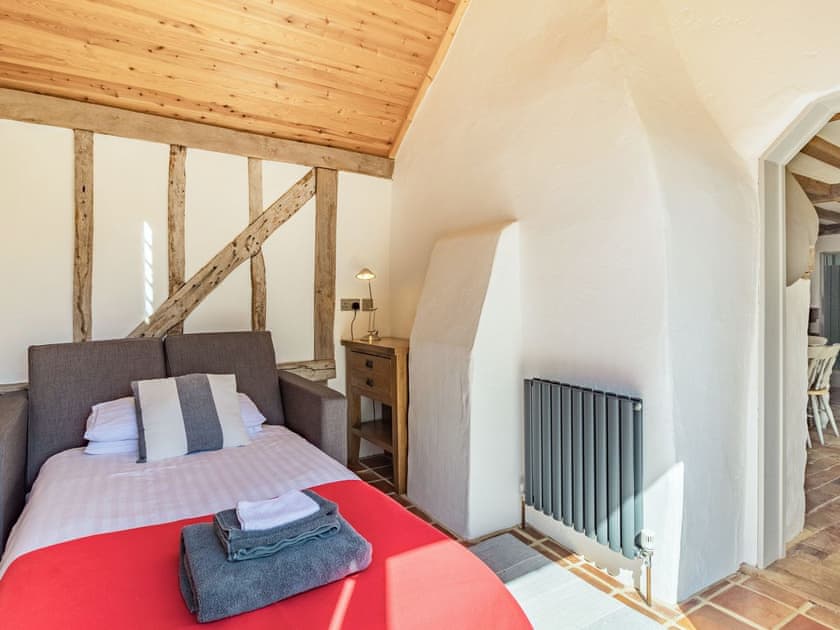 Hall area with sofa bed | Bakers Cottage, Hoxne, near Eye