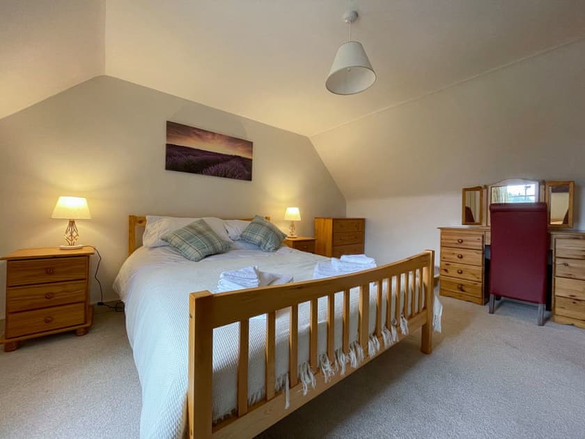 Master bedroom | Milton Cottage, Rosehall, near Lairg