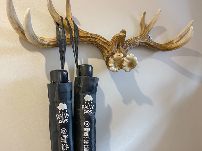 Always prepared - umbrellas and torches provided | Riverside Cottage, Drumnadrochit, near Loch Ness