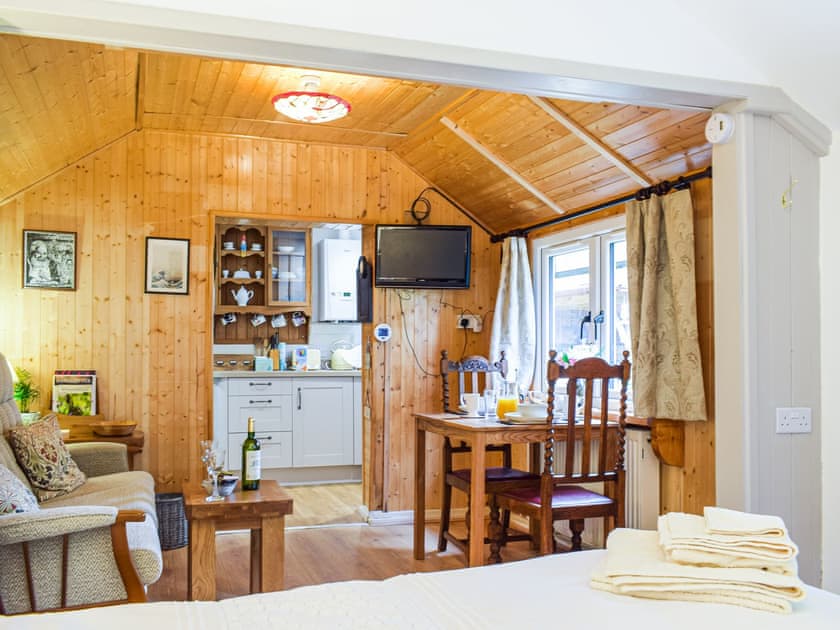 Living area | Woodcarver’s Cottage, Spring Village