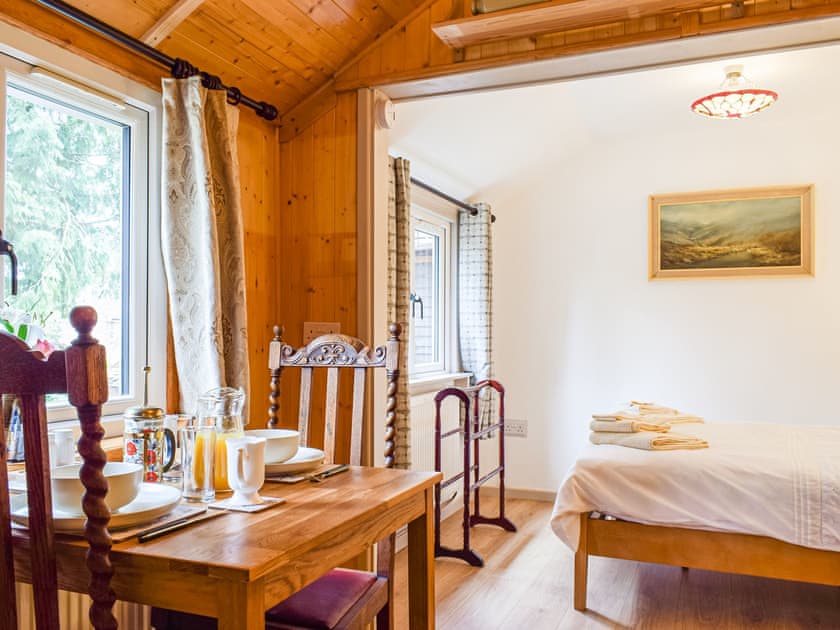Dining Area | Woodcarver’s Cottage, Spring Village