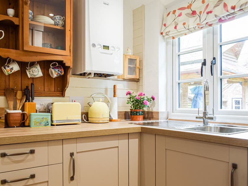 Kitchen | Woodcarver’s Cottage, Spring Village