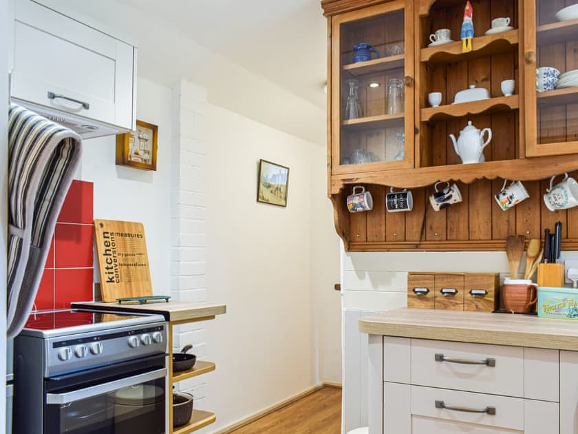 Kitchen | Woodcarver’s Cottage, Spring Village