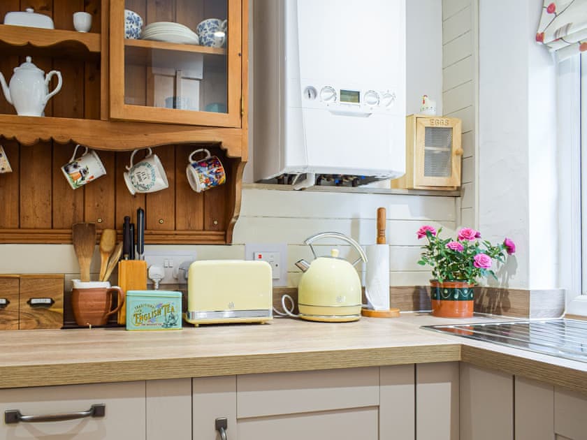 Kitchen | Woodcarver’s Cottage, Spring Village
