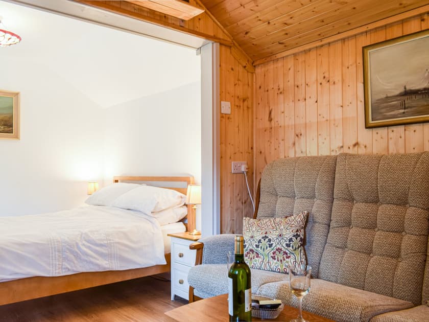 Double bedroom | Woodcarver’s Cottage, Spring Village