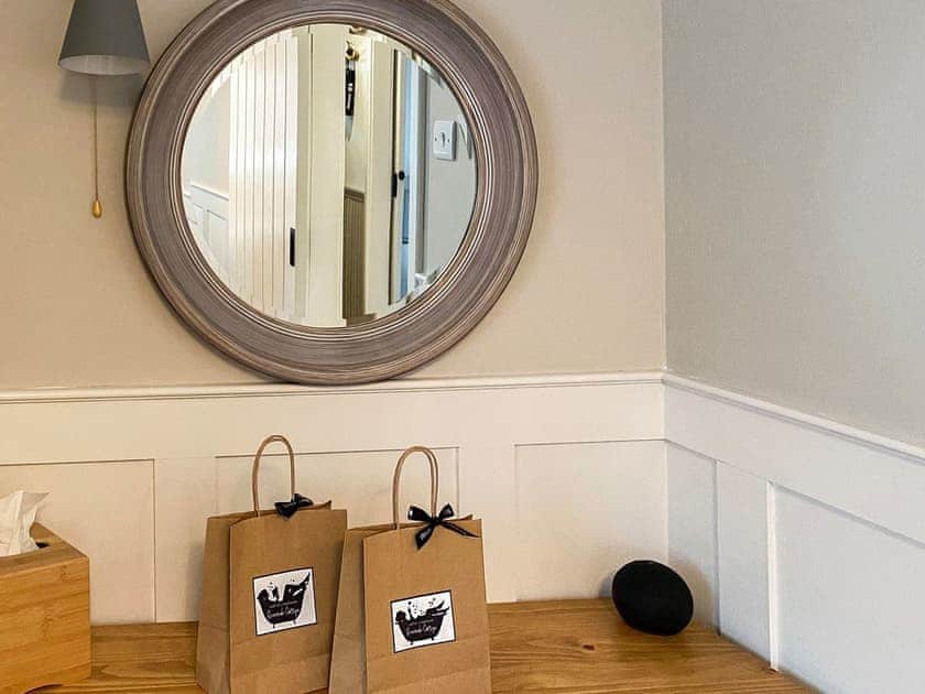 Well-lit mirror and professional grade hairdryer supplied | Riverside Cottage, Drumnadrochit, near Loch Ness