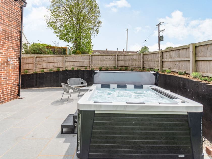 Hot tub | Reed Cottage - Manor Farm Cottages, Flixton, near Filey