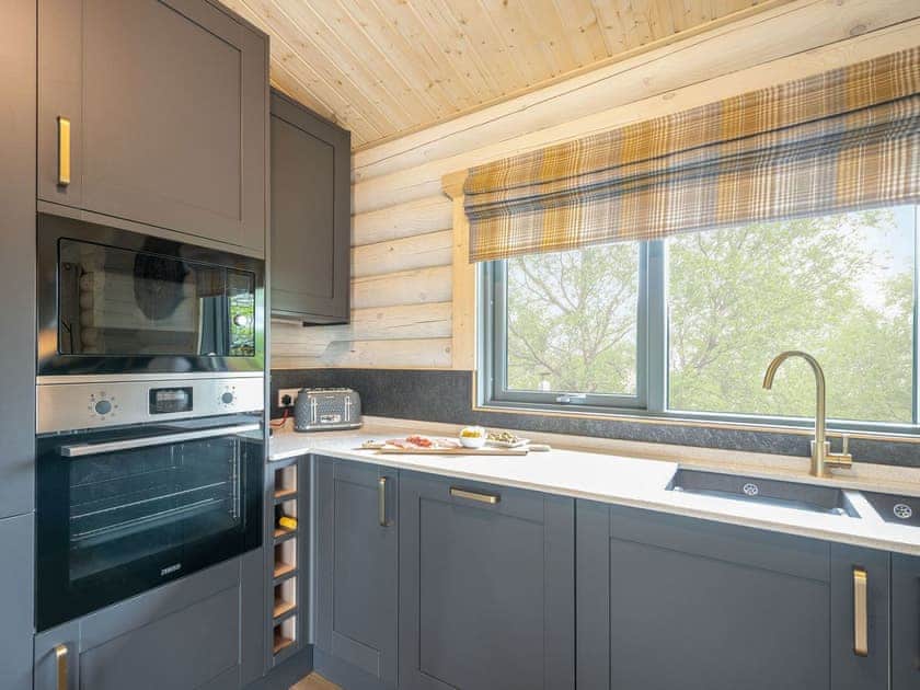 Kitchen | Treetops Log Cabin, Kippford, near Sandyhills