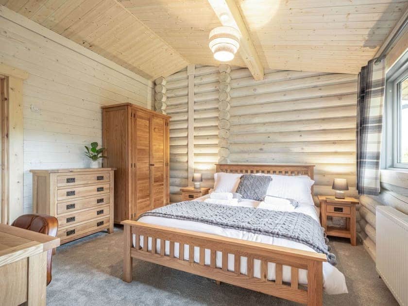 Double bedroom | Treetops Log Cabin, Kippford, near Sandyhills