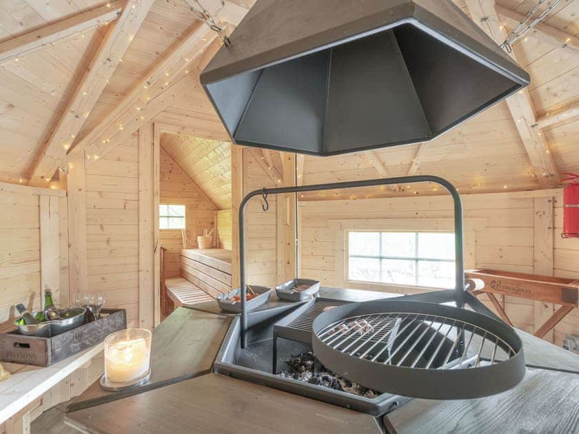 Nordic outbuilding with built in BBQ and Sauna | Treetops Log Cabin, Kippford, near Sandyhills