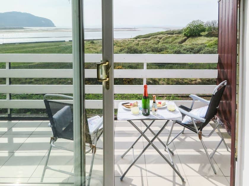 The balcony catches the sun from mid-day to sunset | Sea View, Deganwy, near Llandudno