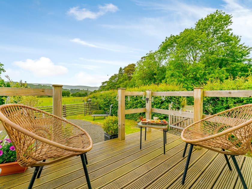 Sitting-out-area | Cwtch Enrico - Hen Efail Holiday Cottages, Furnace, near Machynlleth