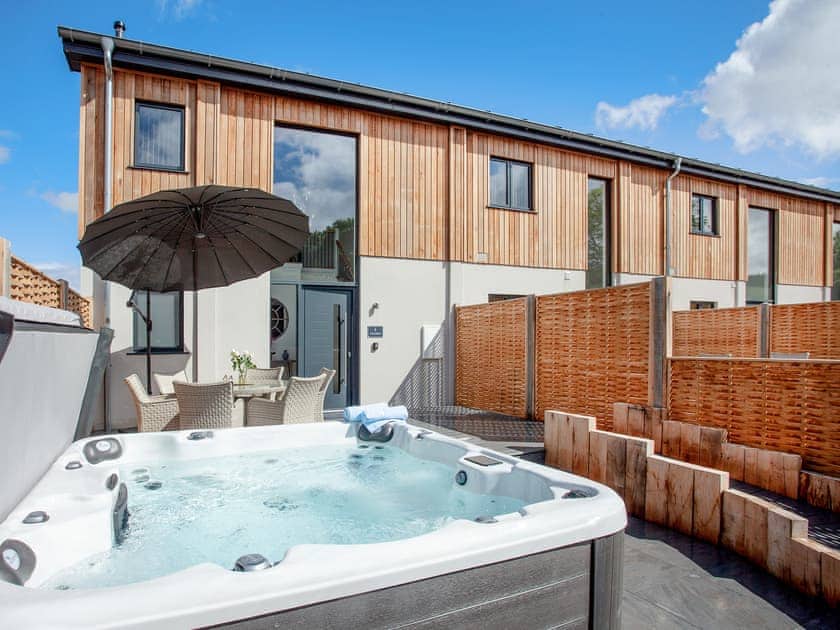 Hot tub | Bluebell - Bincombe Country Cottages, Over Stowey, near Bridgwater