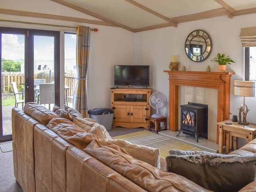 Living room | Y Nyth Yn Bwthyn Coed Gellyg, Dinas Dinlle, near Caernarfon