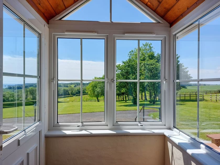 View over garden  | Bay View - Coastal Cottages, Saundersfoot