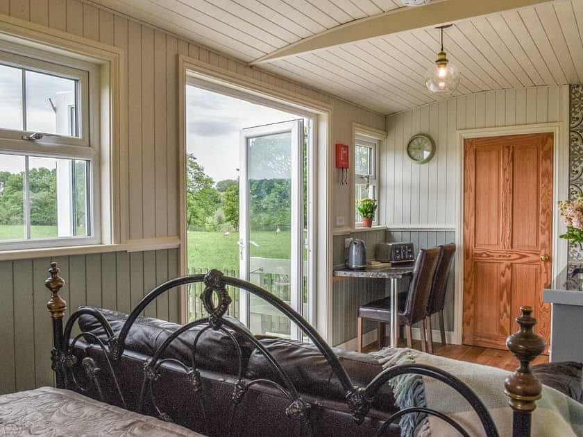 Open plan living space | Ruby’s Hut - Oakenclough House, Oakenclough