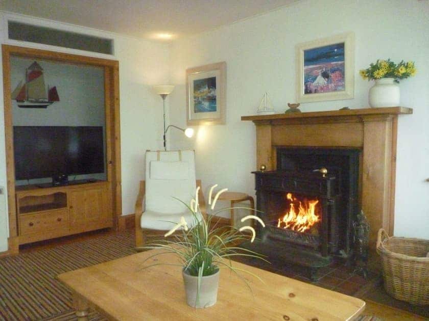 Welcoming living room with wood burner | Tigh an Uillt, Strachur, near Inveraray