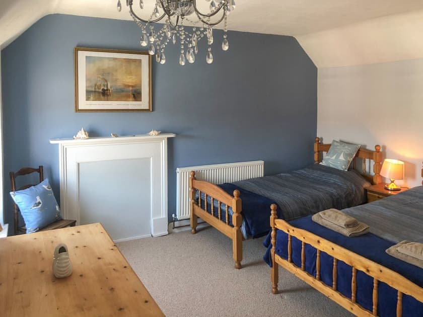 Twin bedroom at the top of the house | The Old Stone House, Swanage