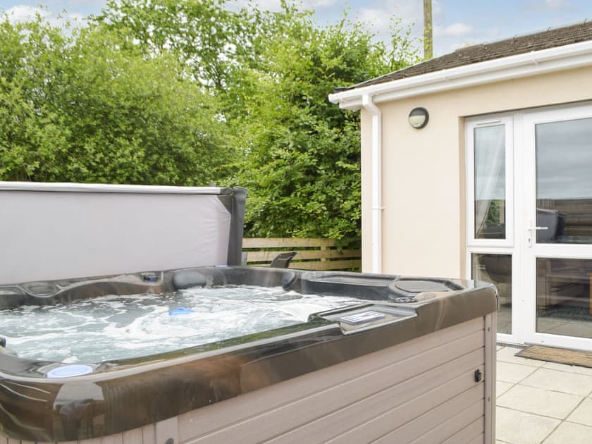 Hot tub | Oak Cottage - Firstone Holiday Cottages, Walwyns Castle, near Broad Haven
