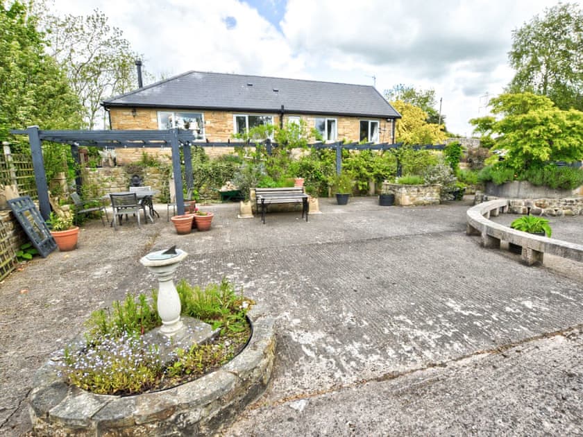 Patio area looking back at cottage | Hadrian’s Garden Villa, Henshaw, near Haltwhistle