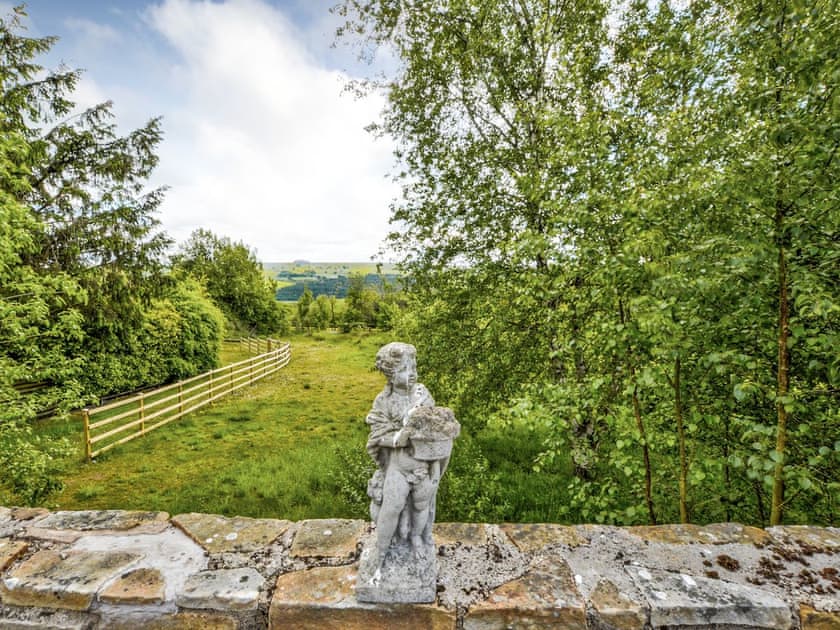 View of paddock south of patio area with Tyne valley beyond | Hadrian’s Garden Villa, Henshaw, near Haltwhistle