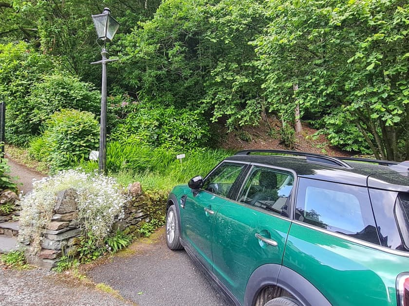 Allocated parking space by the path to the front door | The Old Coach House, Grasmere