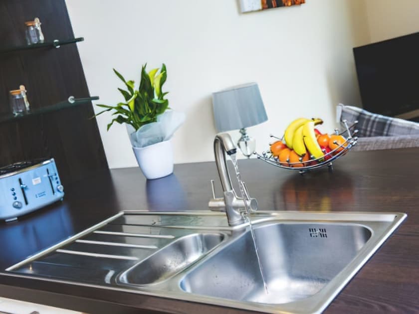 Kitchen area | Garioch Lodge - Clovenstone Lodges, Inverurie