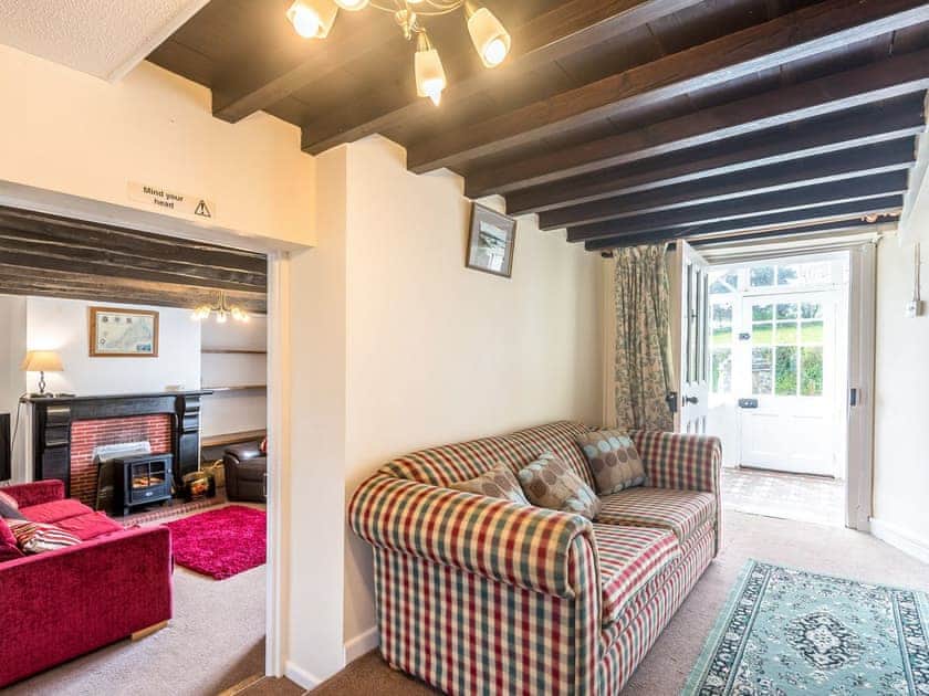 Hallway leading to garden<br /> | Well Farmhouse - Well Farm Holiday Cottages, Holsworthy, near Launceston