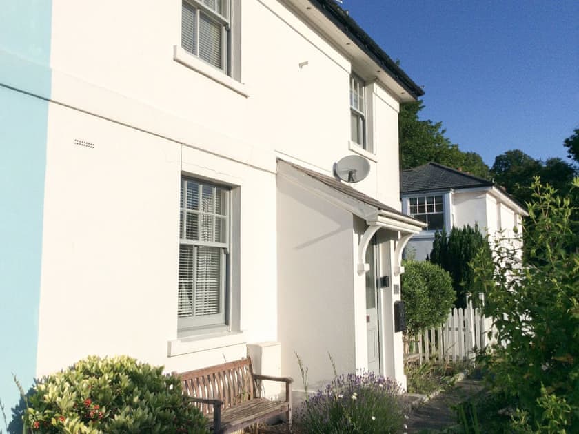 Property frontage with seating providing stunning views of the River Dart and Steam Train and Higher Ferry  | Sandquay View, Dartmouth
