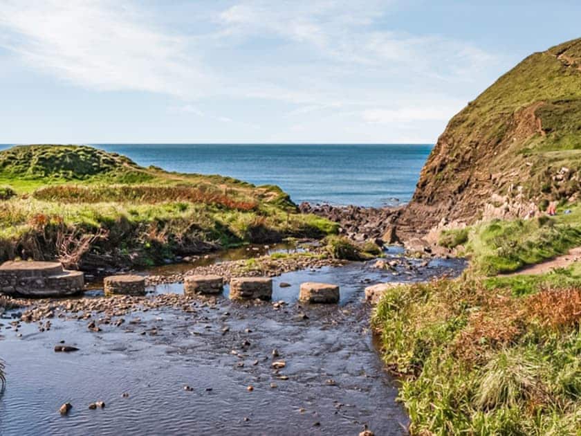 Welcombe Mouth beach, stepping stones and waterfall | Old Smithy BungalowsFoxgloves Bungalow, Welcombe, near Hartland