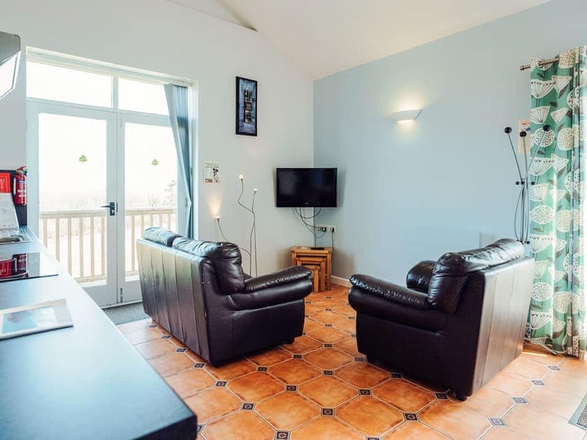Open plan living space | Greenkeepers Cottage - Celtic Haven Resort, Lydstep, near Tenby