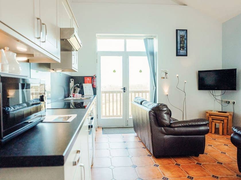 Open plan living space | Greenkeepers Cottage - Celtic Haven Resort, Lydstep, near Tenby