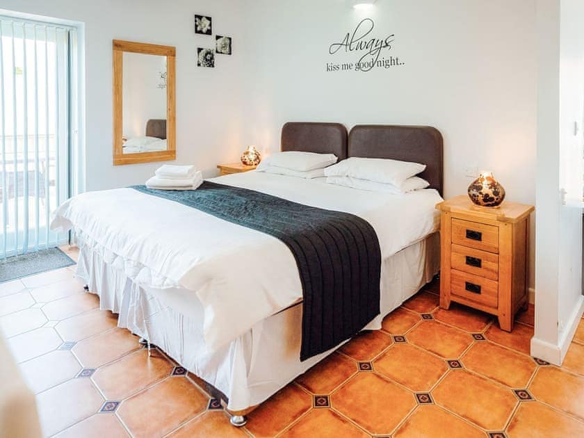 Bedroom | Greenkeepers Cottage - Celtic Haven Resort, Lydstep, near Tenby