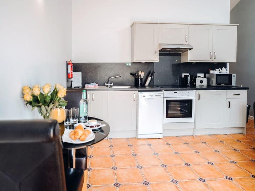 Kitchen/diner | Gardener’s Cottage - Celtic Haven Resort, Lydstep, near Tenby