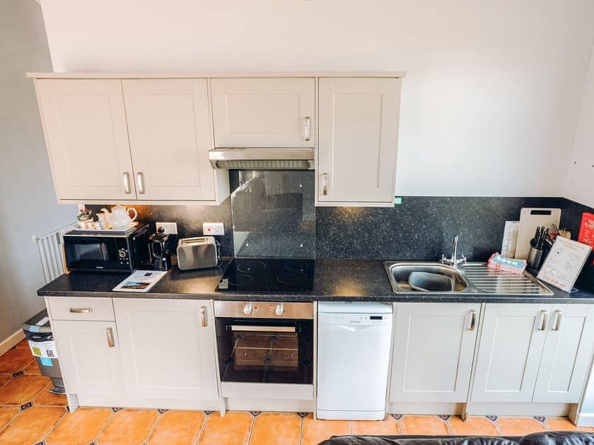 Kitchen | Gardener’s Cottage - Celtic Haven Resort, Lydstep, near Tenby