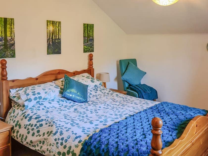 King size bed in the traditional cottage bedroom | Hollin Bank Cottage, Salterforth, near Barnoldswick
