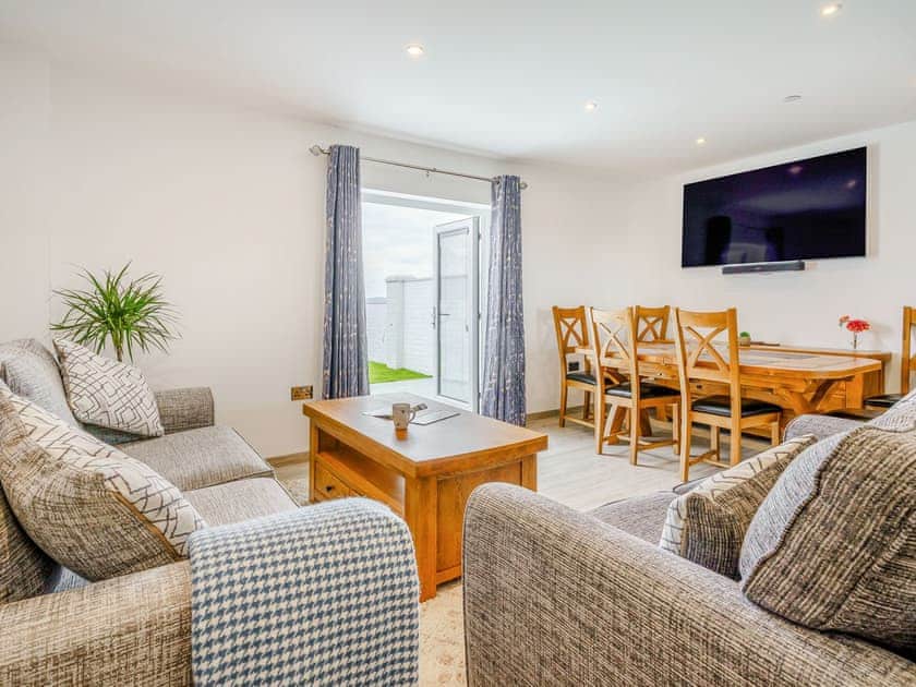 Open plan living space | Willow Tree Cottage - Coastal View Cottages, Ludchurch, near Narberth