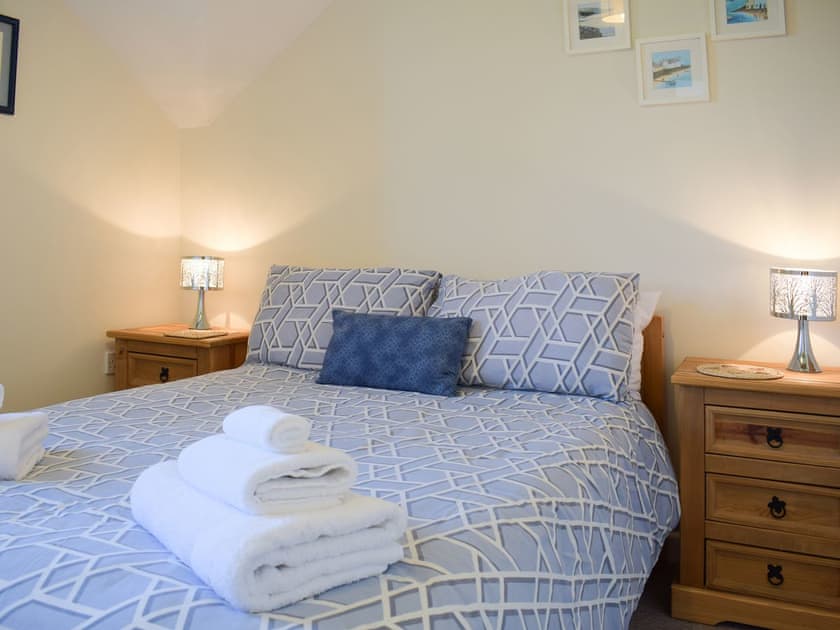 Comfortable bedroom boasting a kingsize bed | Carmarthen Cottages- Barn Cottage - Carmarthen Cottages, Cwmdu, Near Llandeilo