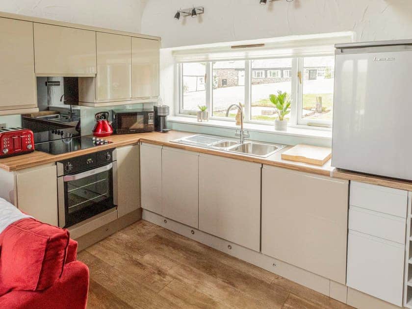Kitchen area | Trespaddick - Treworgie Barton Cottages, Crackington Haven