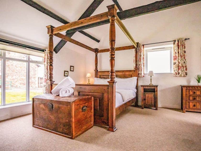 Four Poster bedroom | Bligh - Treworgie Barton Cottages, Crackington Haven