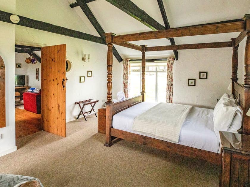 Four Poster bedroom | Bligh - Treworgie Barton Cottages, Crackington Haven