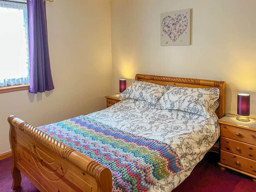 Prettily presented double bedroom | Acorn Cottage, Conon Bridge
