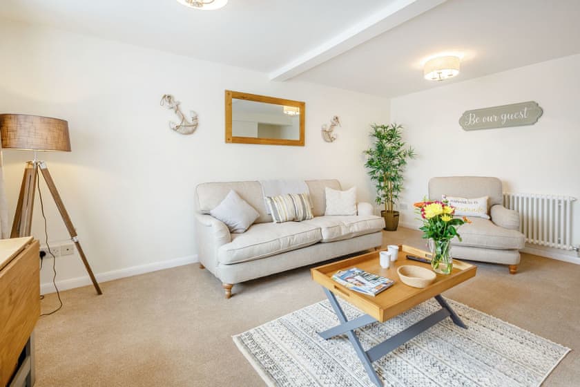 Living room/dining room | Seaside Cottage - Bron y Wendon Holiday Park, Llanddulas, near Llandudno