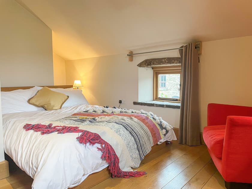 Double bedroom.  Please note sloping ceiling and low bed may not be suitable for the physically challenged. | The Sheep Shack, Hayfield, High Peak
