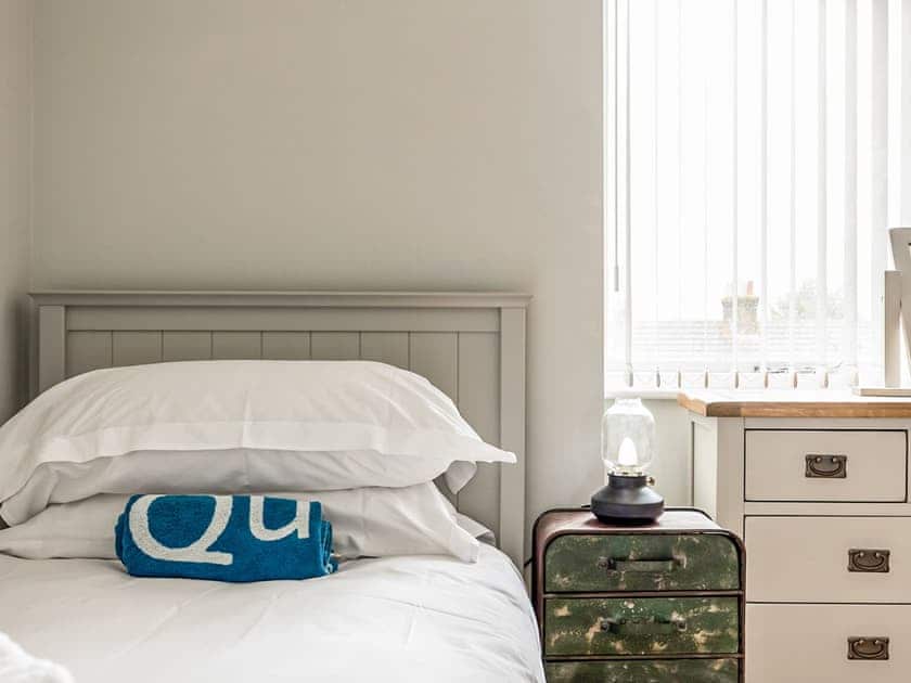 Twin bedroom | Candle Island View, Poole