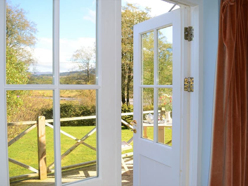 Door to garden | Shelduck Cottage, Glendaruel, near Tignabruaich