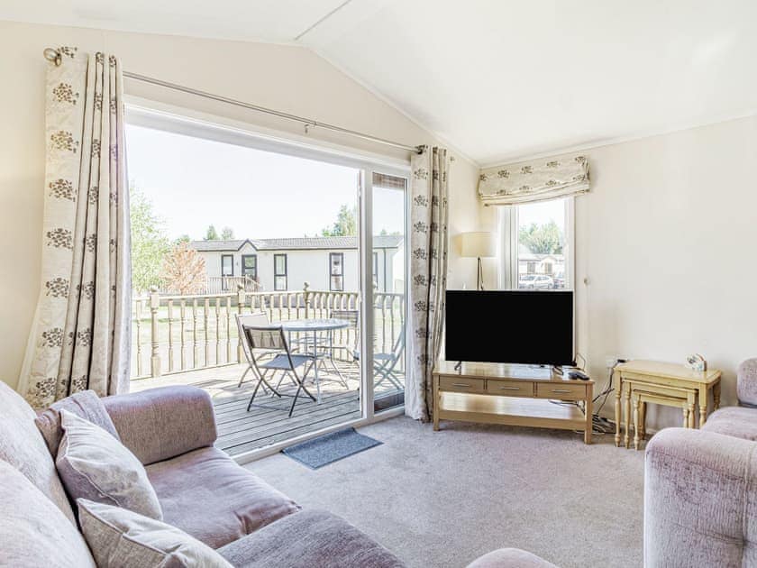 Living area | Carnoustie Lodge, Tydd St Giles