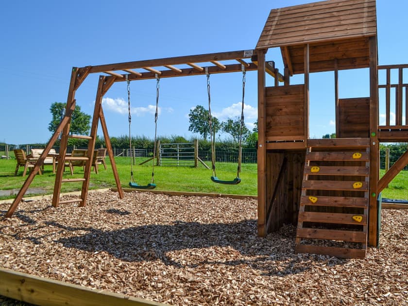 Children’s play area | Fieldside Farmhouse, Dovenby, Cockermouth