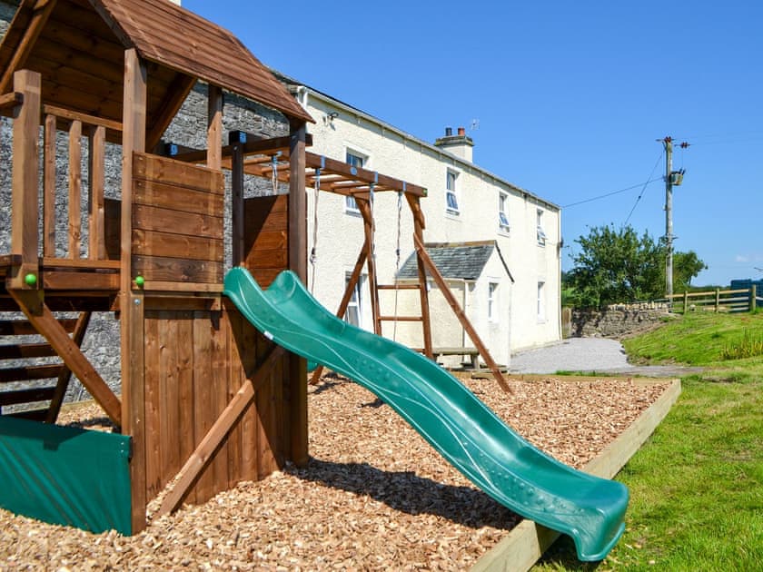 Children’s play area | Fieldside Farmhouse, Dovenby, Cockermouth
